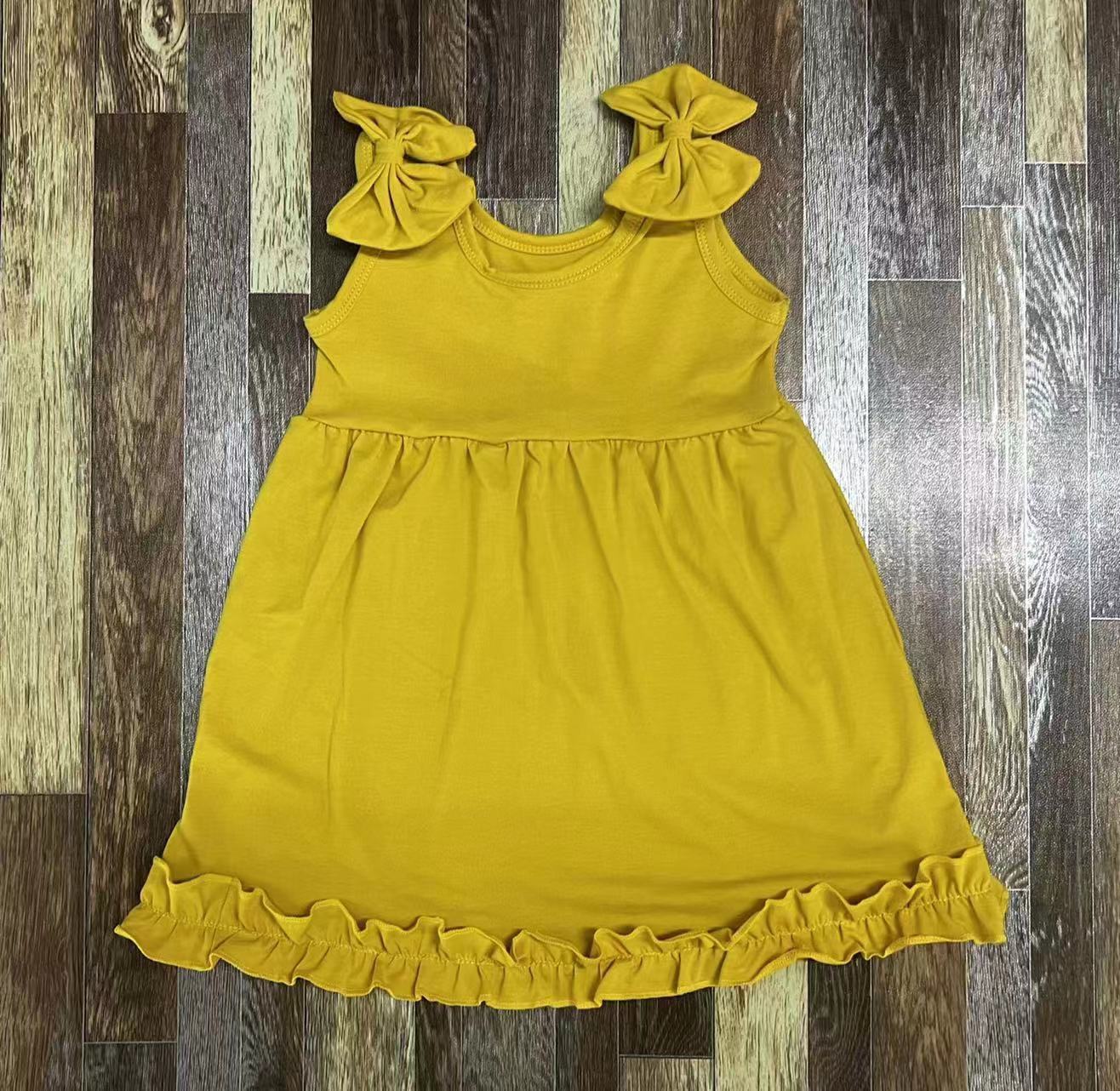 Yellow Sleeveless Ruffled Dress with Bow Details
